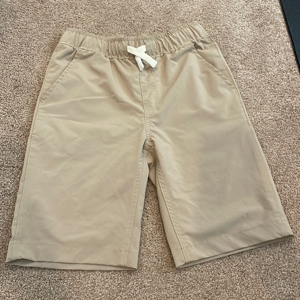 Boys pull on shorts